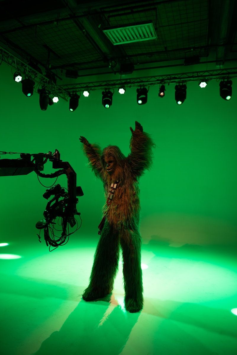 image of star war's character chewbacca being filmed in a green screen studio