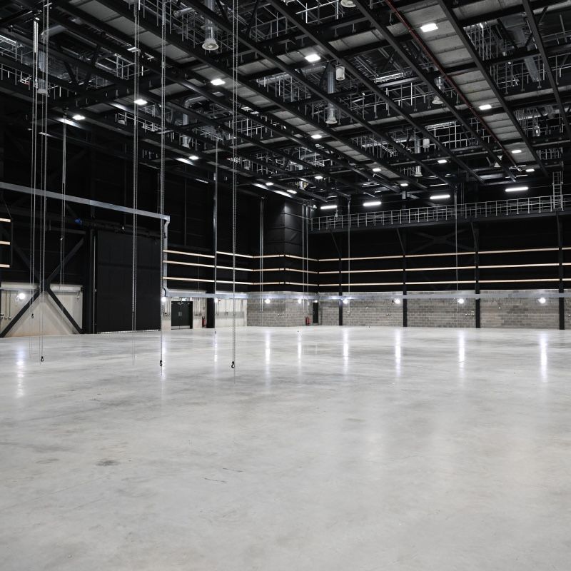 Inside a large empty sound stage at Pinewood Studios lot